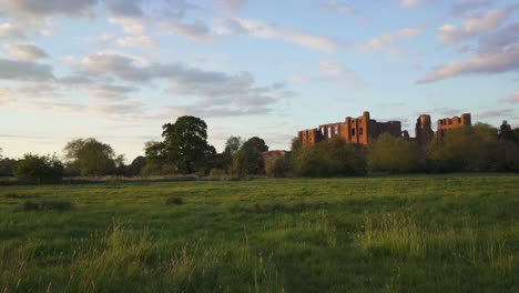 Perfect-English-summer-evening-with-a-slow-panning-showing-the-mighty-ruins-of-Kenilworth-castle-just-before-sunset