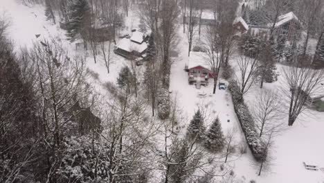 scenic snow-covered forest landscape with a winding river in countryside, sherbrooke, canada.