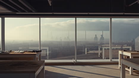 modern office or workshop interior with a panoramic cityscape view