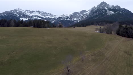 flying drone over swiss alps in austria