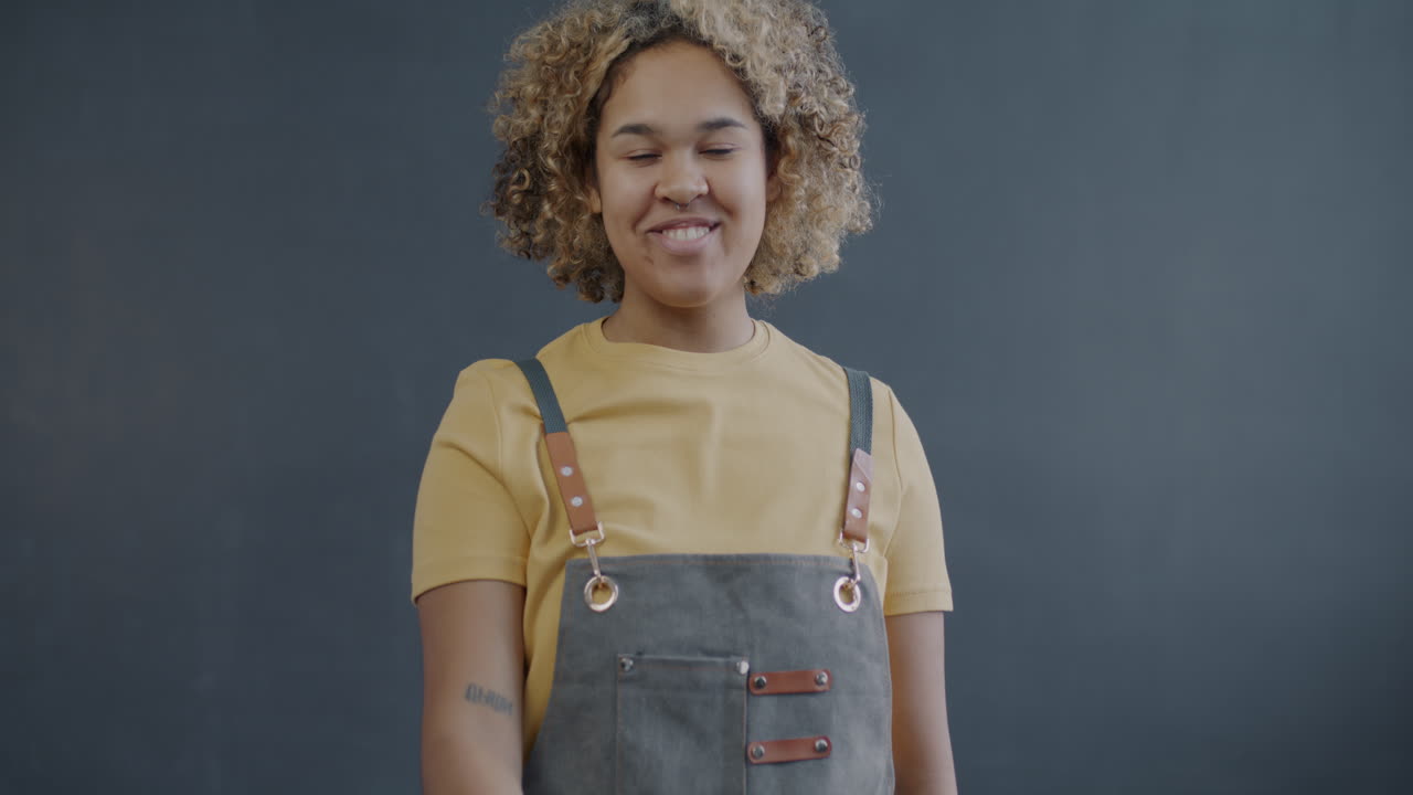 Young Woman Giving an Ok Gesture
