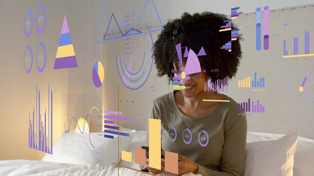 Woman sitting on bed tapping smartphone, finance charts appearing over face while reviewing data