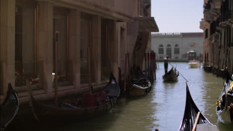 Canal-with-gondolas-in-Venice-Italy