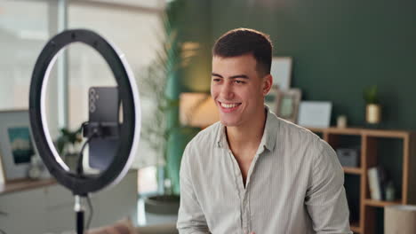 man vlogging with ring light