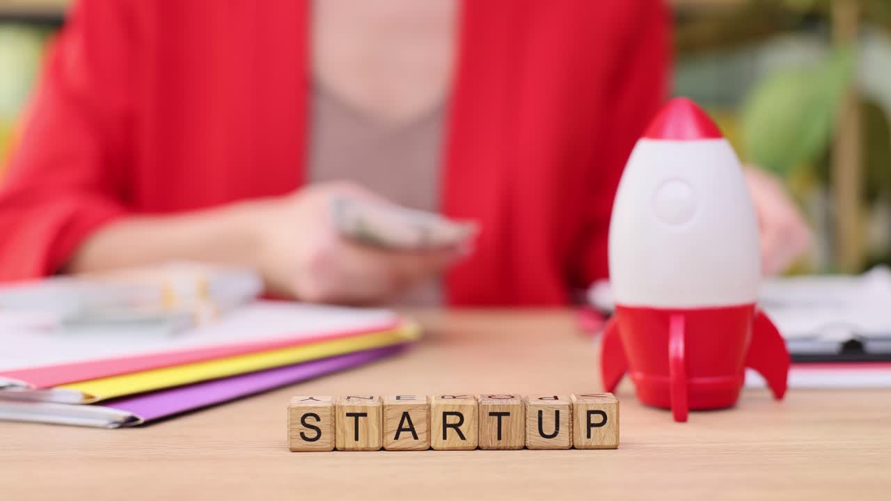 Startup business concept with rocket and money