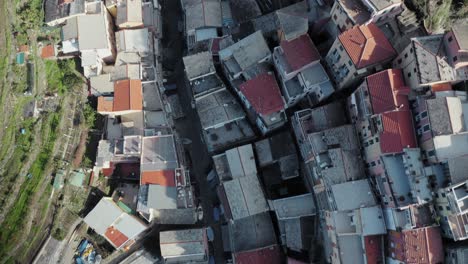 Aerial-view-of-Manarola,-Cinque-Terre,-during-a-sea-storm