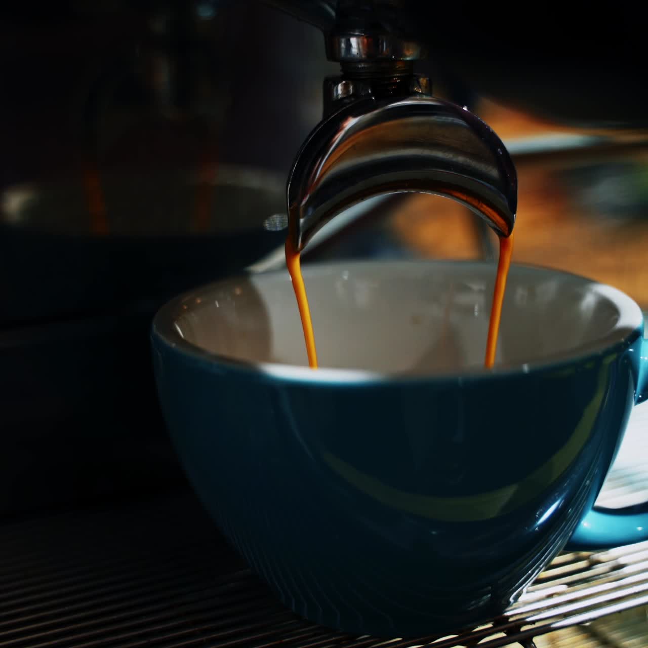 Barista makes coffee in cafe