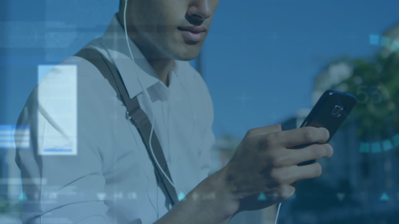 Animation of financial data processing and statistics over biracial man using smartphone