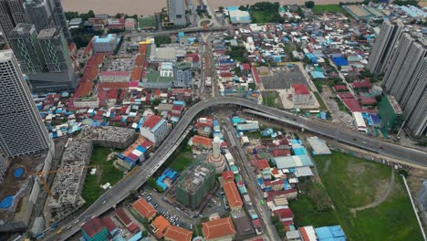aerial view of phnom penh city, cambodia: modern skyscrapers and densely populated areas