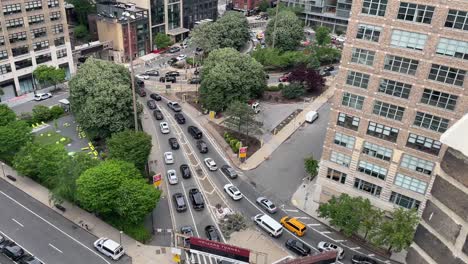 new york city looking out at buildings then down to the traffic jam