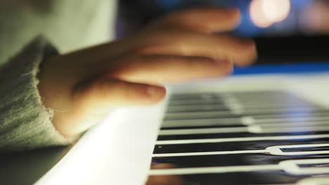 child playing piano