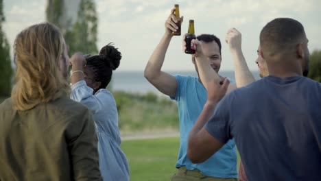 Smiling-people-having-fun-during-open-air-party