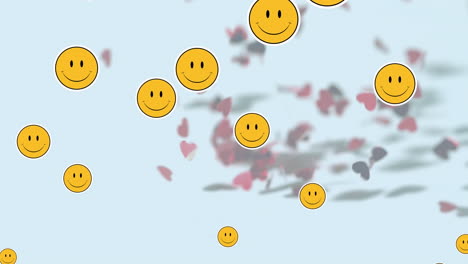 multiple smiling face emojis floating over multiple hearts falling against white background