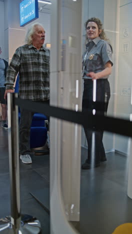 airport security checkpoint with elderly passenger