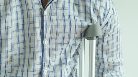 man with crutches