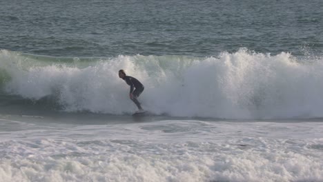 surfing with great trimming and amazing snap on the end in cascais, europe