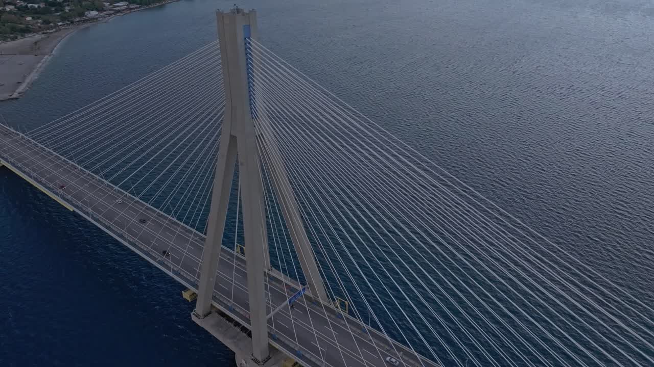 Aerial view of highway bridge with sunset haze in Rio, Greece