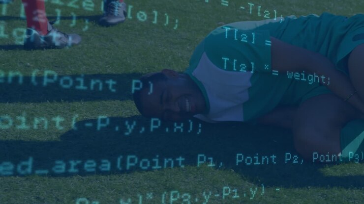 Data processing against injured african american male soccer player holding his leg on sports field