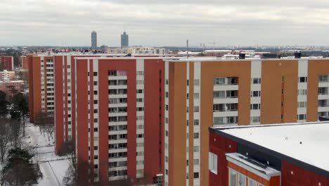 Winter-Aerial-Flyover-High-Rise-Apartment-Buildings-Stockholm,-Sweden