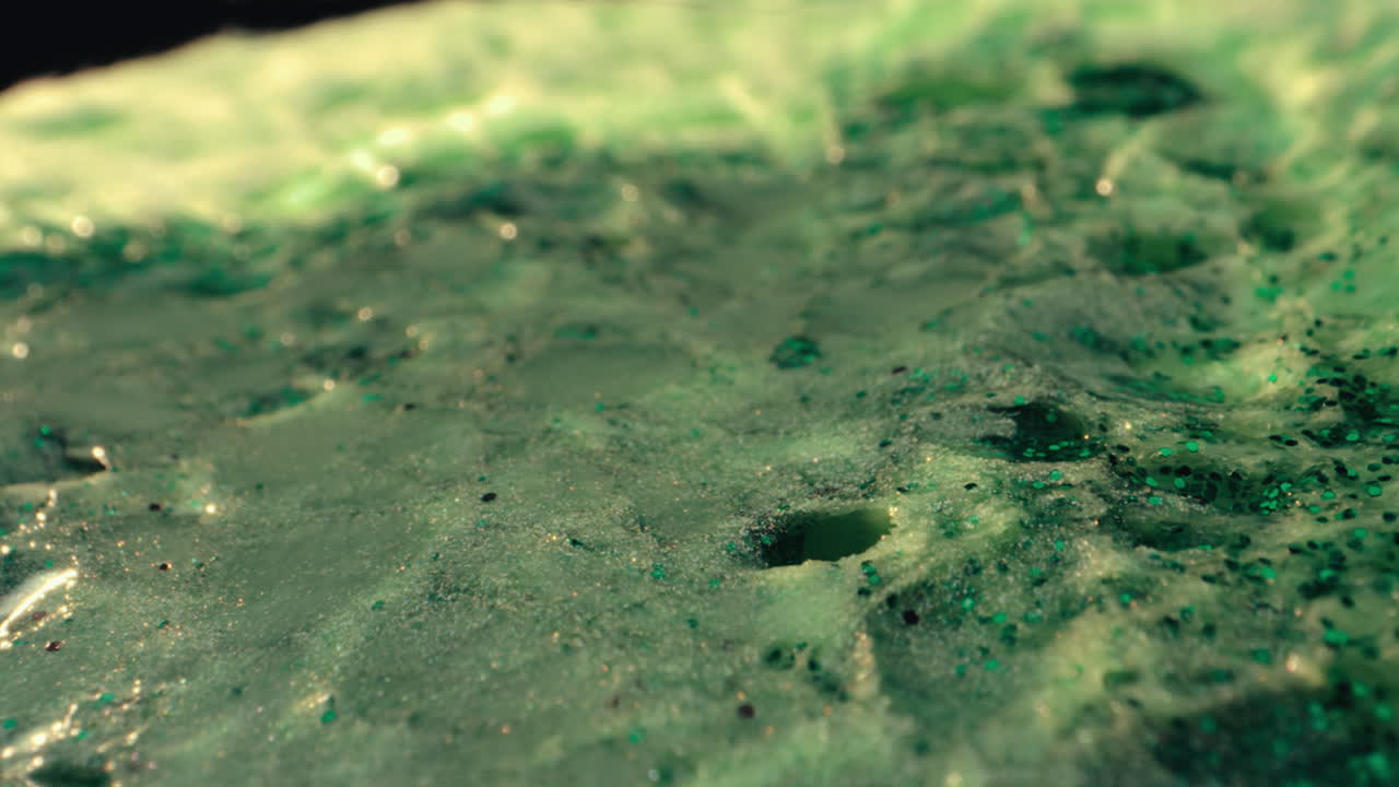 Close-up of Green Glitter Slime