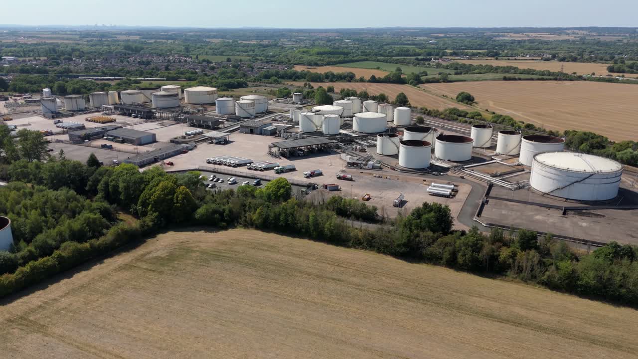 Aerial drone perspective of chemical plant and energy park with fuel silos in Kingsbury England UK featuring petroleum gas distribution facilities