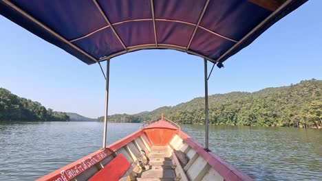 boat journey on calm water amidst green hills