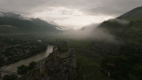 Atsquri-Fortress-Remnants-On-The-Bank-Of-Mtkvari-River-On-A-Foggy-Day-In-Georgia