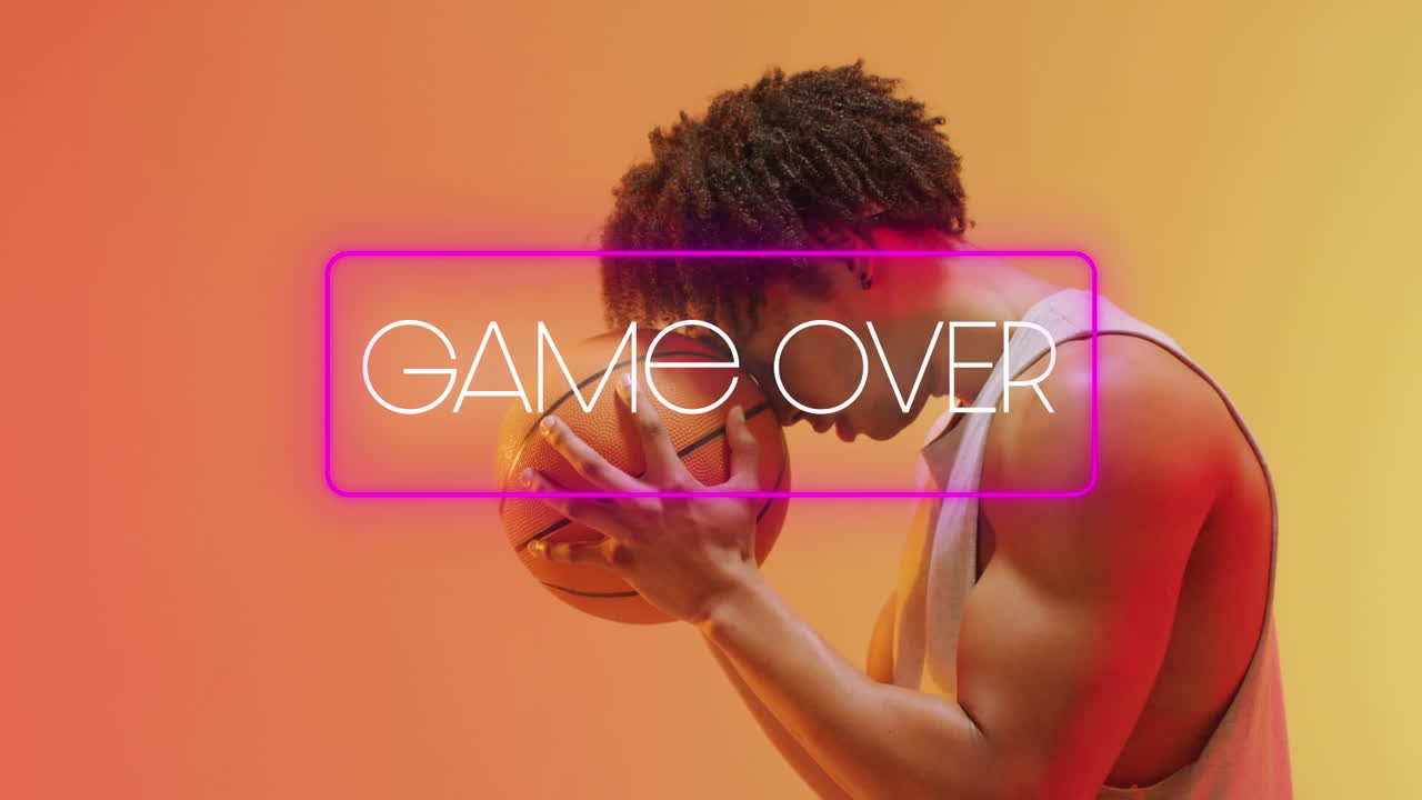 Animation of game over text over basketball player on neon background