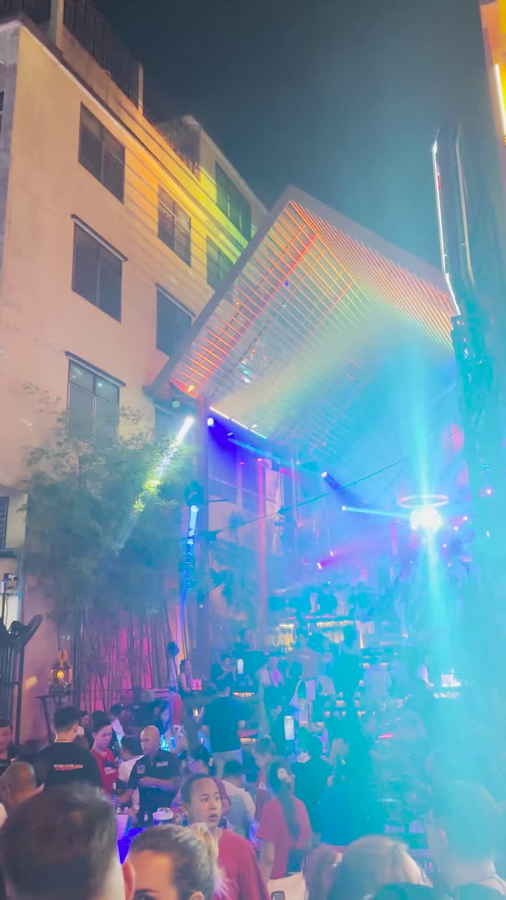 Nightlife in Bangkok: Crowds at a vibrant outdoor nightclub