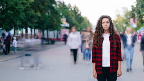 Young woman standing on a city street