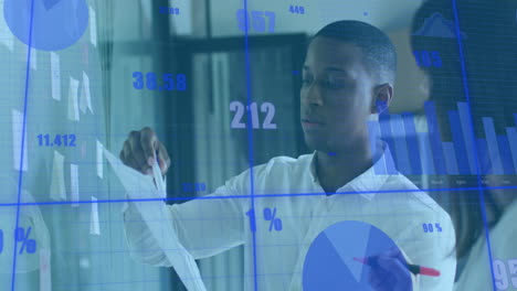 Animation-of-graphs-and-changing-numbers-over-diverse-coworkers-planning-strategy-on-whiteboard