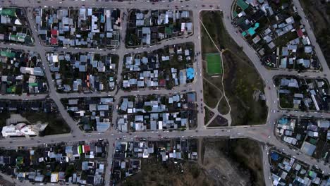 top down drone shot flying along the grid of ushuaia, argentina