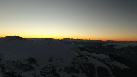 aerial sunset snowy mountains la plagne in the french alps