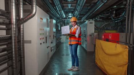 Woman Engineer Working in Industrial Plant