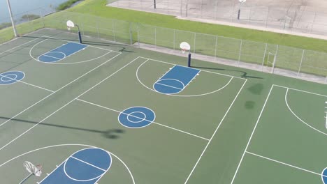 200" high smooth aerial of basketball court orbiting in a smooth movement