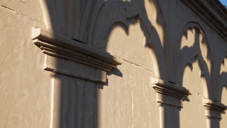 ornamental stone wall with arched detail