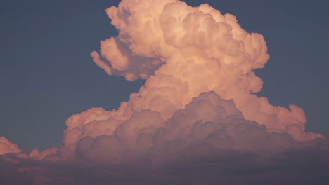 massive cumulus cloud at sunset