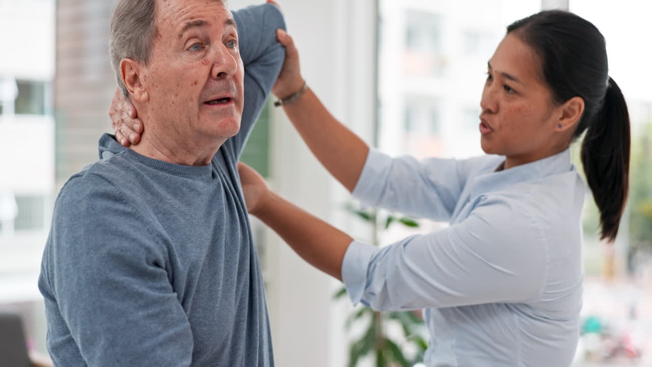 Man, patient and physiotherapist stretching arm