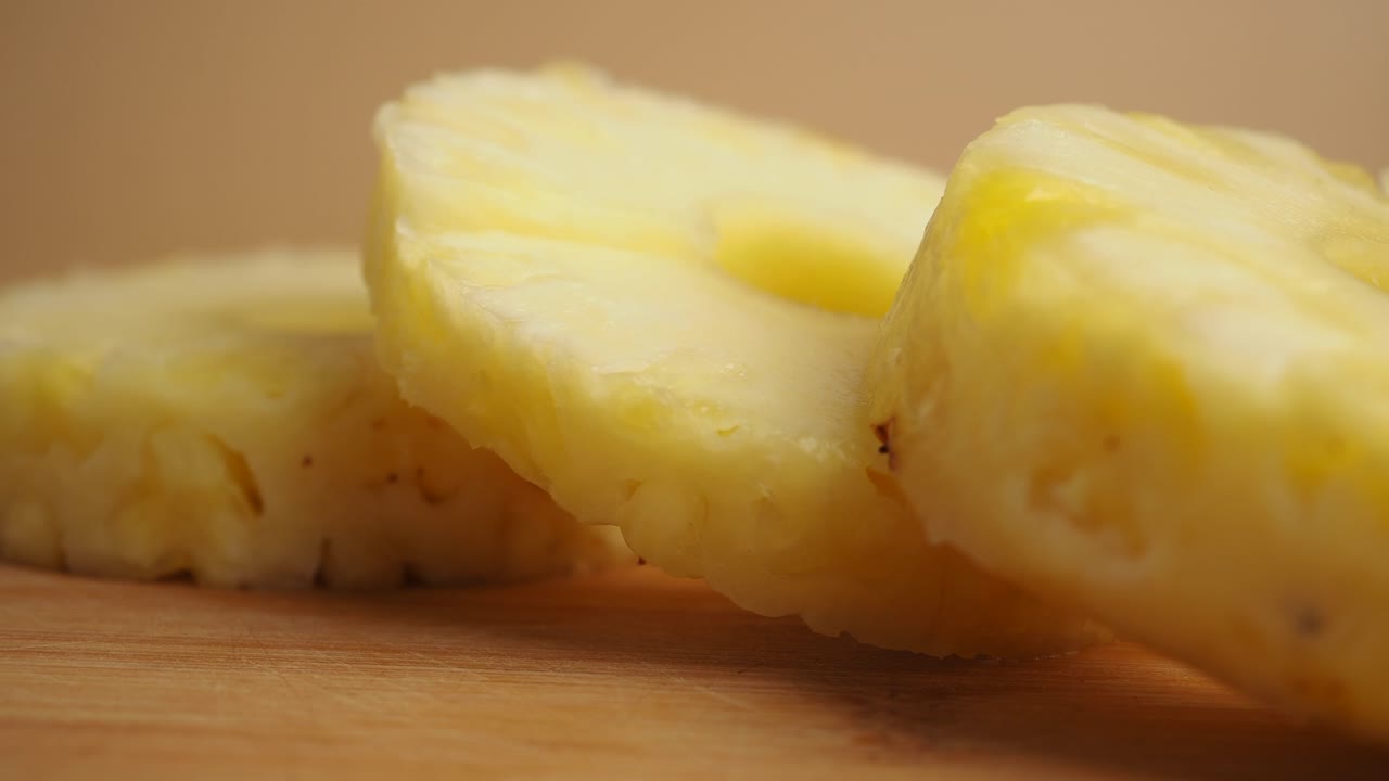 Close-up Rack Focus on Fresh Pineapple Slices