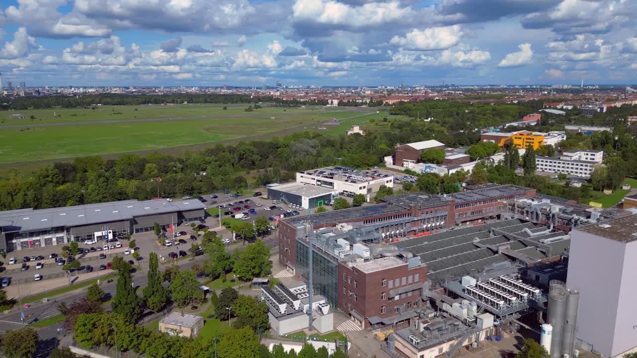 Aerial view of a factory and cityscape