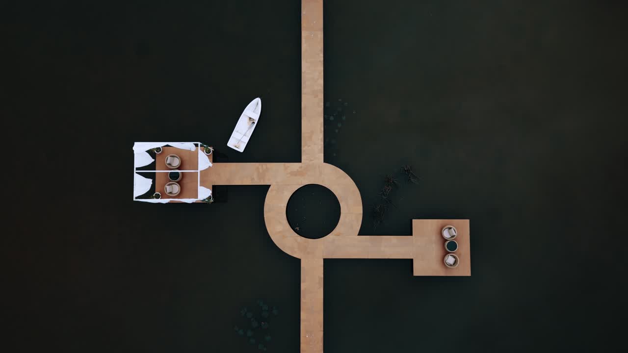 Top down fly over wooden walkway, perfect symmetry, circlar and straight
