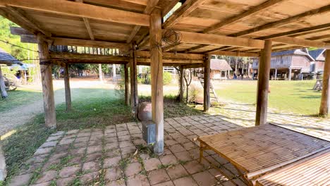 wooden structure in a rural thai setting