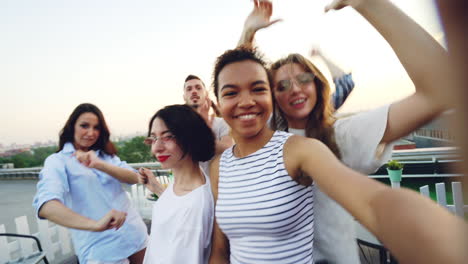 friends enjoying a rooftop party