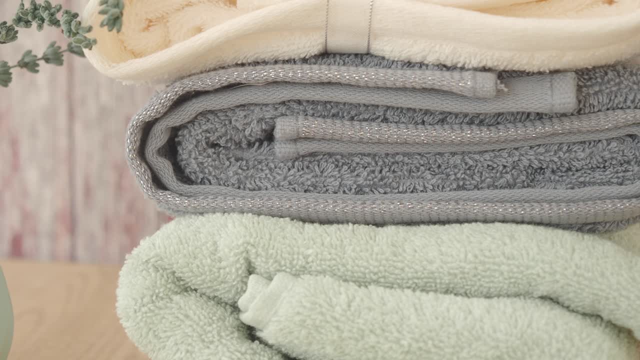 Stacked Bath Towels in Different Colors