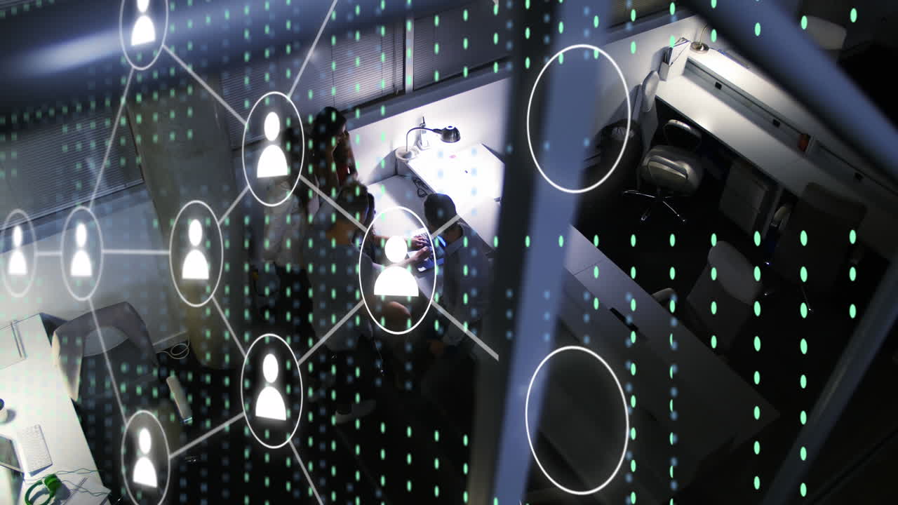 Animation of icons and data processing over diverse business people working in office