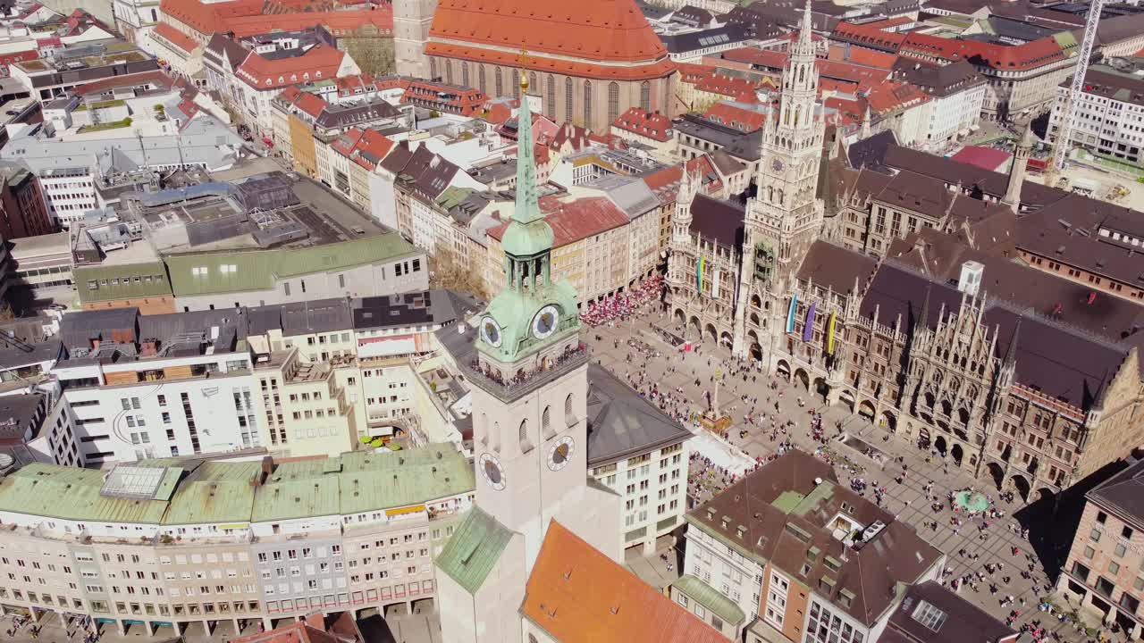 Marienplatz, New Town Hall, St. Peter Church, And Frauenkirche Cathedral In Munich, Germany. - aerial shot