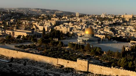 drone footage pull back of dome on the rock city walls and gates historic christian holy land