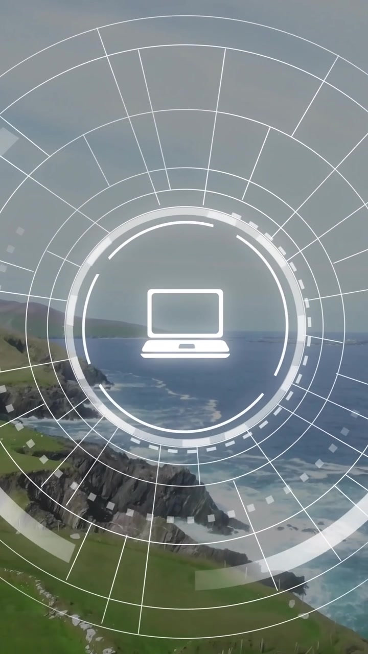 Animation of digital interface with computer icon overlaying coastal ocean waves