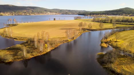 fjord flowing into beautiful wheat fields