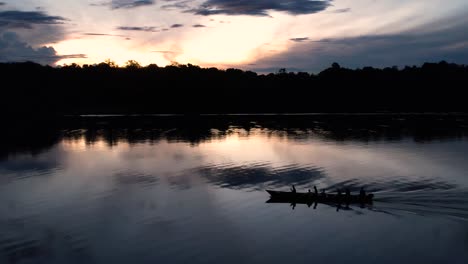 boat at sunset on the amazon river